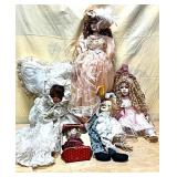 Lot of Porcelain Dolls Tallest is 27'