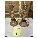 Pair of cherub lamps