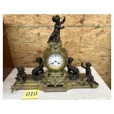 Brass and bronze chair of clock 26" x 21" nice
