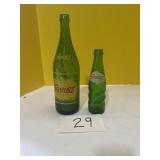 Two vintage squirt, glass green bottles