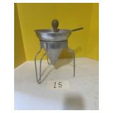 Vintage aluminum tomato strainer