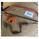 Hand drill, hand saw cable and a cable puller