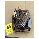 Flat full of screwdrivers and a Corvette door