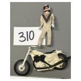 Evel Knievel and his motorcycle/Motorcycle Take Of