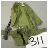 Two G.I. Joe, army jackets and toy gun