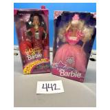 Two Barbie dolls