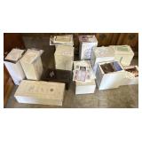 12 porcelain dolls never taken out of the box