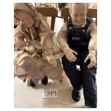 Grandma and grandpa dolls in their rocking chair