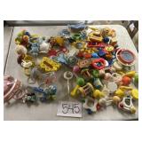 Vintage baby rattlers and toys