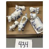 Blue cow collection, tiny damage on the inside of