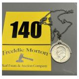Authentic Ike dollar made into a necklace