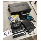 Vintage Polaroid camera with attachments a