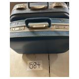 Two vintage small suitcases