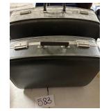 Two vintage luggage suitcases