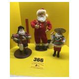 3 Santas one is animated