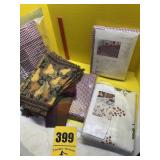 Box full of tablecloths