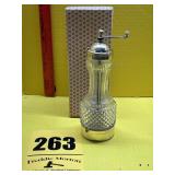 Vintage glass pepper grinder with the original
