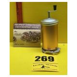 Vintage cookie press with recipes and directions