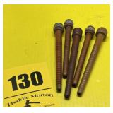 Five wooden spindles