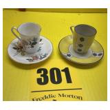 Two tea, cups, and saucers