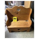 Heart shaped bench with storage box. Nice piece.