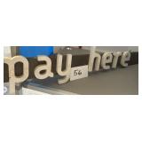 Pay here sign