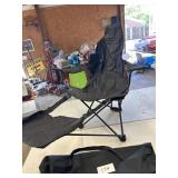 Folding chair with foot rest and carrying bag