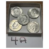 Five bicentennial Ike dollars