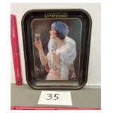 Coca-Cola tray lady from the roaring 20s
