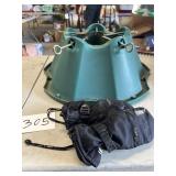 Womenï¿½s ski gloves and Christmas tree stand