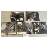 5 Elvis while hanging pictures