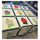 Hand stitched quilt with flower patterns 66ï¿½ x