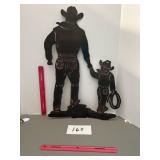 Metal cut out of cowboy and his son