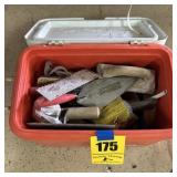 Cooler full of concrete tap supplies