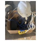 Box of tools, hardhat, and cords
