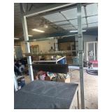 Heavy duty work table with rack holders heavy