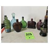 Several old liquor bottles