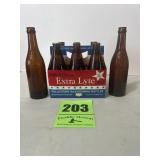 Glass beer bottles, including Fyfe & Drum Extra