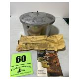 Vintage pressure cooker with jigger and necessary