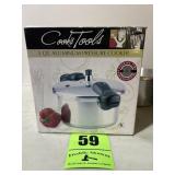 5) Qt. Aluminum pressure cooker.