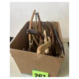 Box full of wooden coat hangers