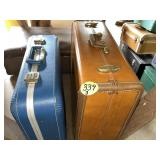 (2) Suitcases