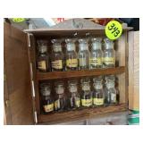Spice Jars in Cabinet
