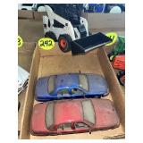 Bobcat Loader & (2) Ford Cars