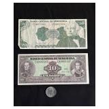 Venezuelan banknotes and a coin