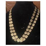 Gold Toned Necklace With Chinese Symbol