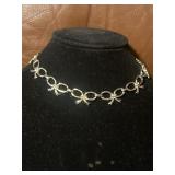 Silver Toned Choker With Bow Design