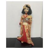 Beautiful Asian Doll on Stand