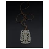 carved bone pendant
