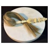 An antique horse hair fly whisk carved ivory